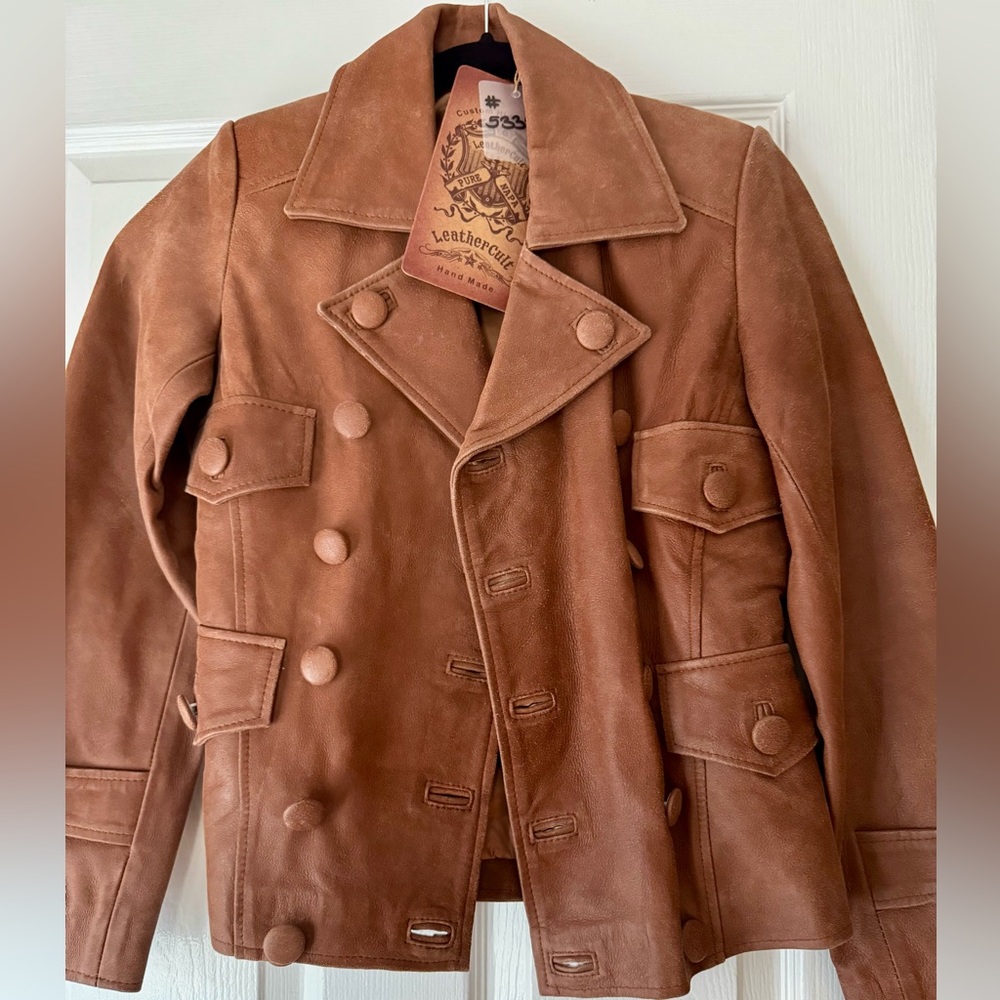 Brand new handmade brown bespoke leather jacket. Tags still on.